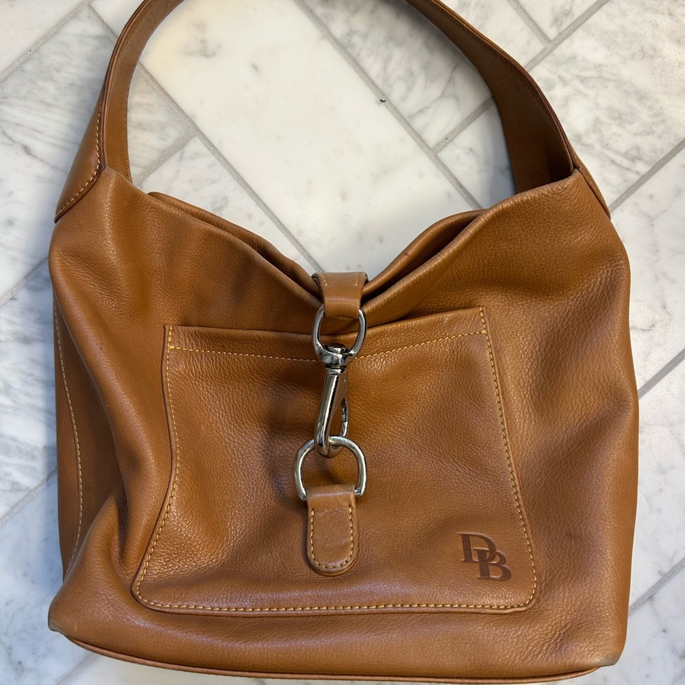 Dooney and Burke tan leather bucket bag